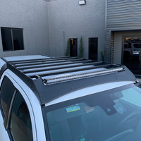 Top view of Economy Roof Rack on a white Toyota Tacoma - Cali Raised LED