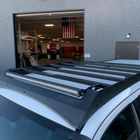 Top view of Economy Roof Rack on a white Toyota Tacoma - Cali Raised LED