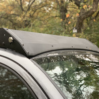 Close up view of gray Toyota Tacoma with Premium Roof Rack with covered light bar - Cali Raised LED