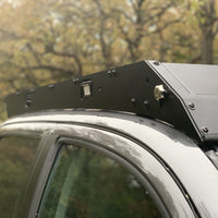 Close up view of gray Toyota Tacoma with Premium Roof Rack with covered light bar - Cali Raised LED