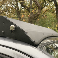 Close up view of gray Toyota Tacoma with Premium Roof Rack with covered light bar - Cali Raised LED
