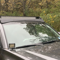 Front view of gray Toyota Tacoma with Premium Roof Rack with exposed light bar- Cali Raised LED