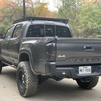 Rear view of gray Toyota Tacoma with Premium roof rack - Cali Raised LED