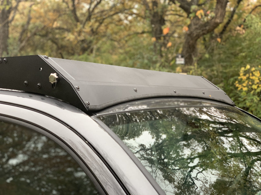 Close up view of gray Toyota Tacoma with Premium Roof Rack with covered light bar - Cali Raised LED