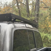 Rear view of gray Toyota Tacoma with Premium Roof Rack - Cali Raised LED
