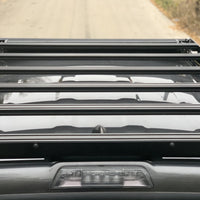 Top down rear view of gray Toyota Tacoma with Premium roof rack - Cali Raised LED